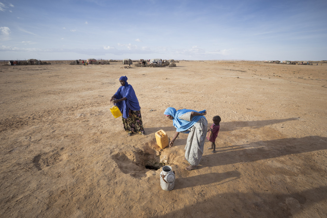 Ayan Said getting water from a water well in a settlement for people internally displaced in the town of Garadag. Somaliland, Northern Somalia, March 2017. Photo: Petterik Wiggers/Oxfam