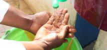 Hand-Washing, to prevent Ebola in Sierra Leone. Photo: Will Wintercross/Oxfam