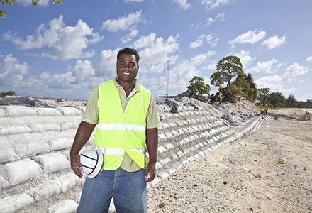 A worker who helped to construct coastal defences in  Tarawa, Kiribati
